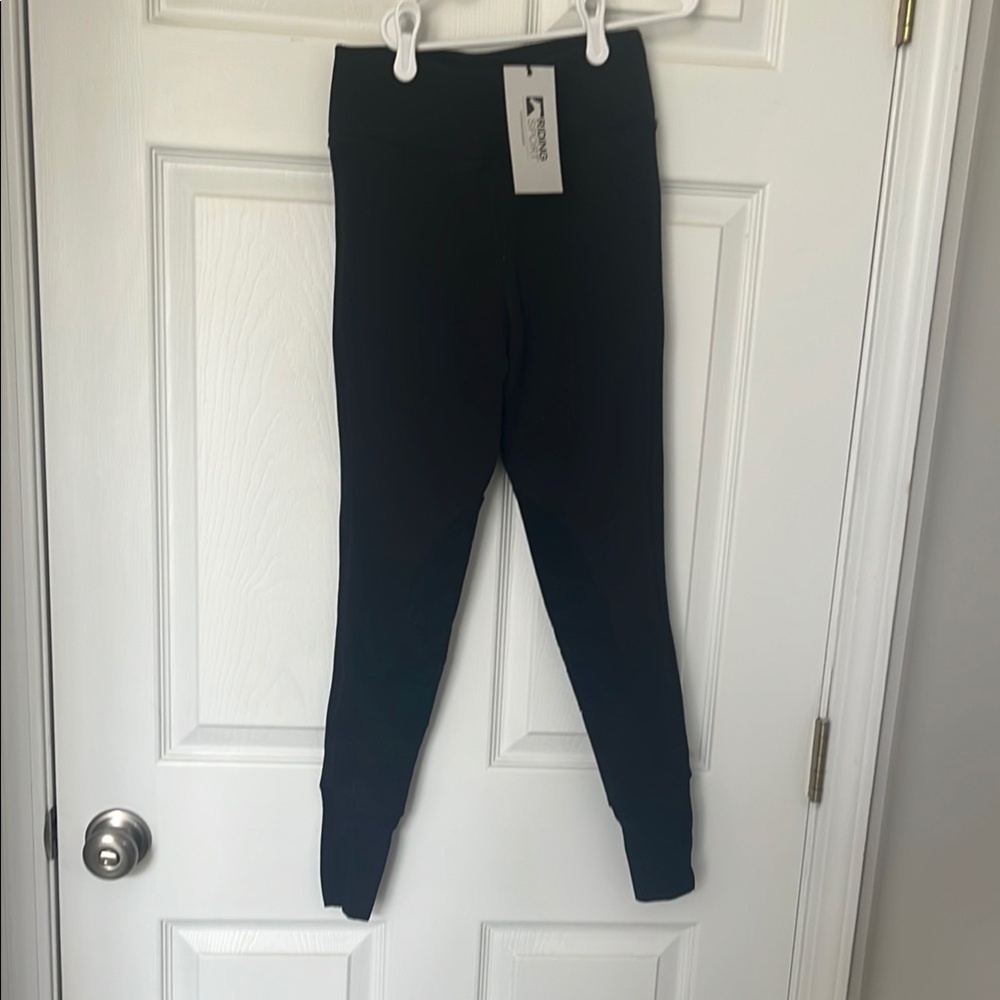 Sleek Black Leggings with Stretchy Fabric and Wide Waistband